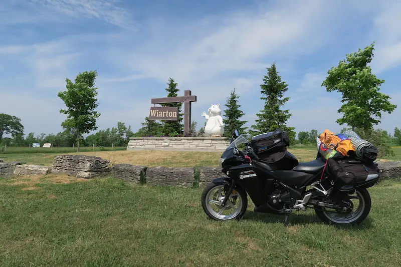 Stopping at the Wiarton sign as part of my Wiarton motorcycle cruise to Tobermory