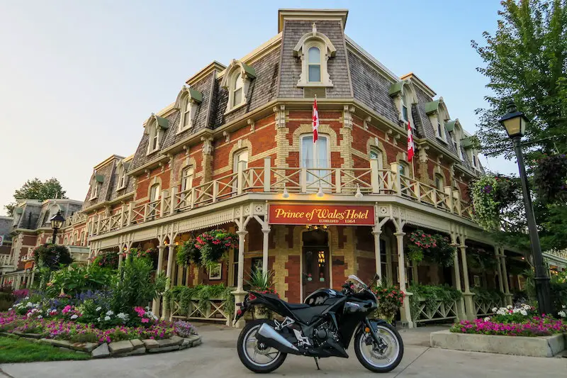 motorcycle parked out front of the prince of wales hotel in niagara on the lake