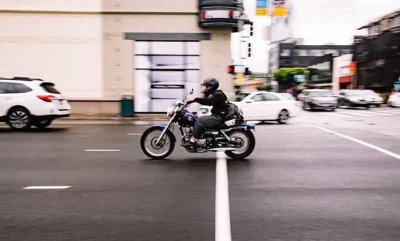 riding a motorbike downtown