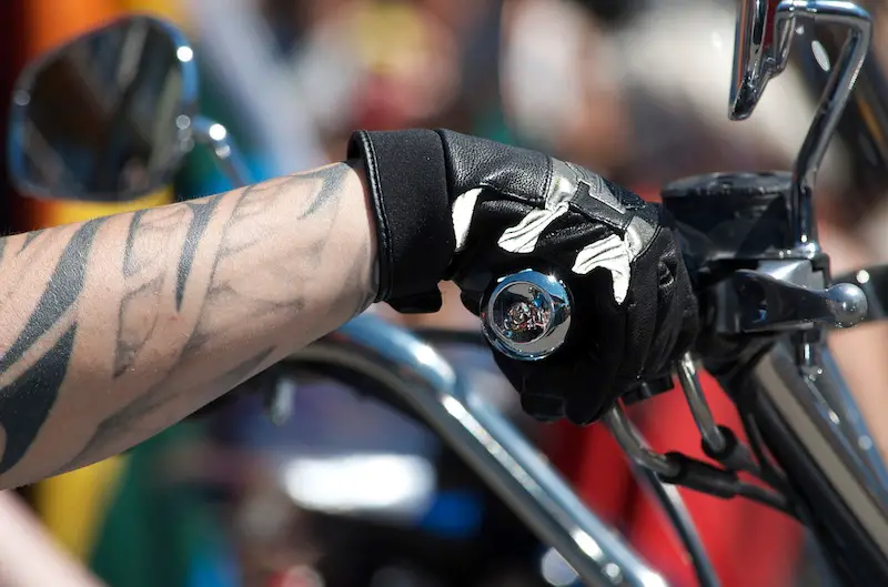 biker wearing gloves on cruiser