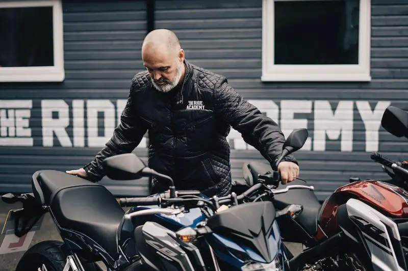 man wearing motorcycle jacket