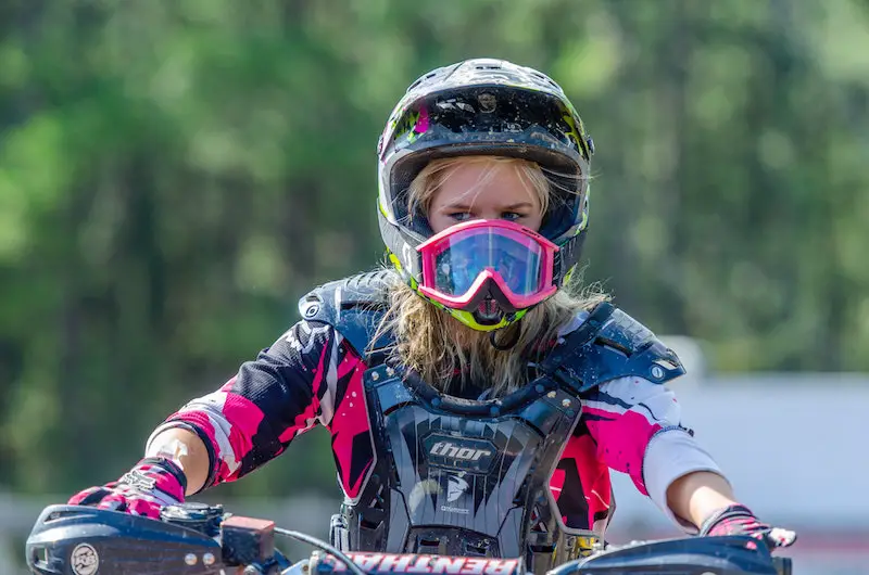 girl wearing dirt bike goggles