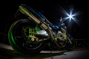 motorcycle lit up at night