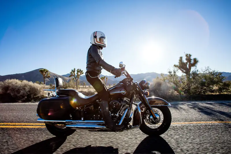 riding a harley davidson and standing up